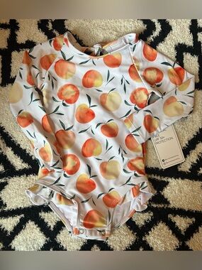 Current Tyed- Kids Long-Sleeve Peach Print One-Piece Swimsuit